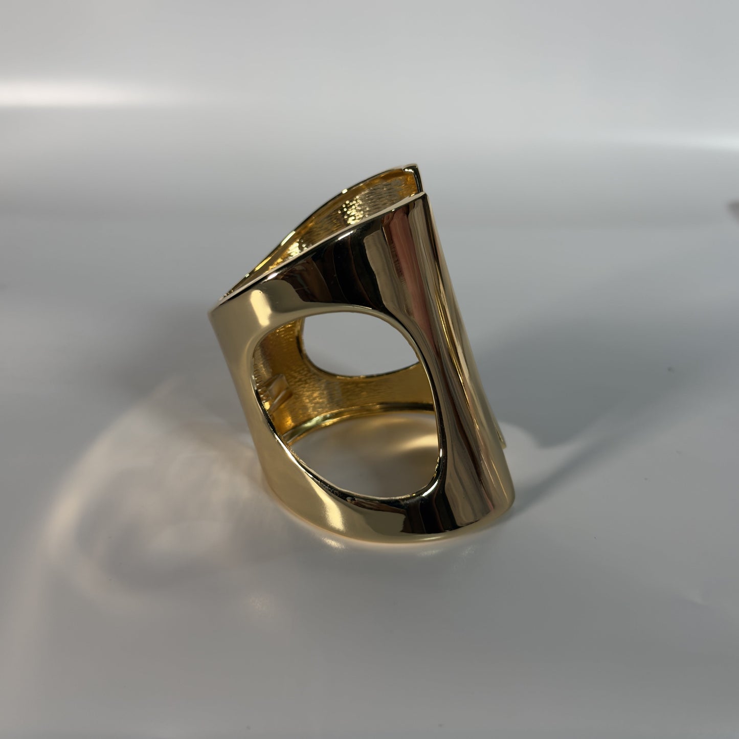 Gold ring on a white background